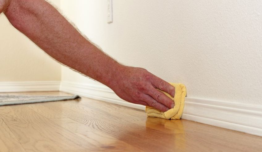cleaning baseboards