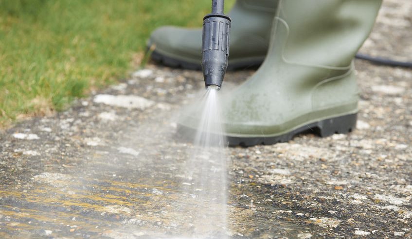 sealing concrete path with sprayer